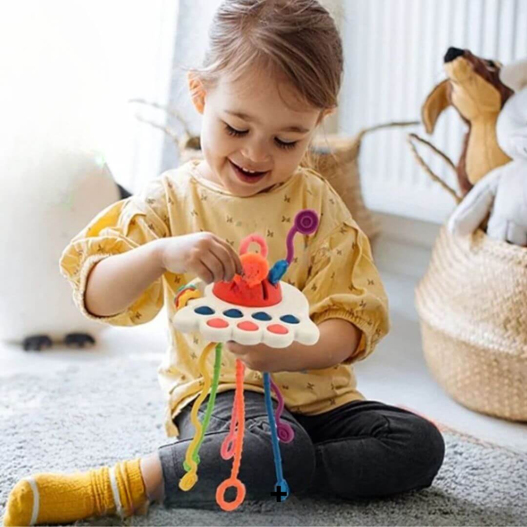 jouet sensoriel bébé rouge